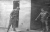 Фото 480. 26 февраля 1979 года. Луэна. Лагерь ЗАПУ Бома. После бомбежки, неразорвавшаяся шариковая бомба возле нашей бани. Фото из архива В.Лебедева.